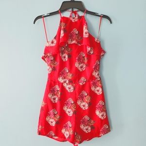 Love @ First Sight ruffle top halter romper. Size small. Red floral pattern.